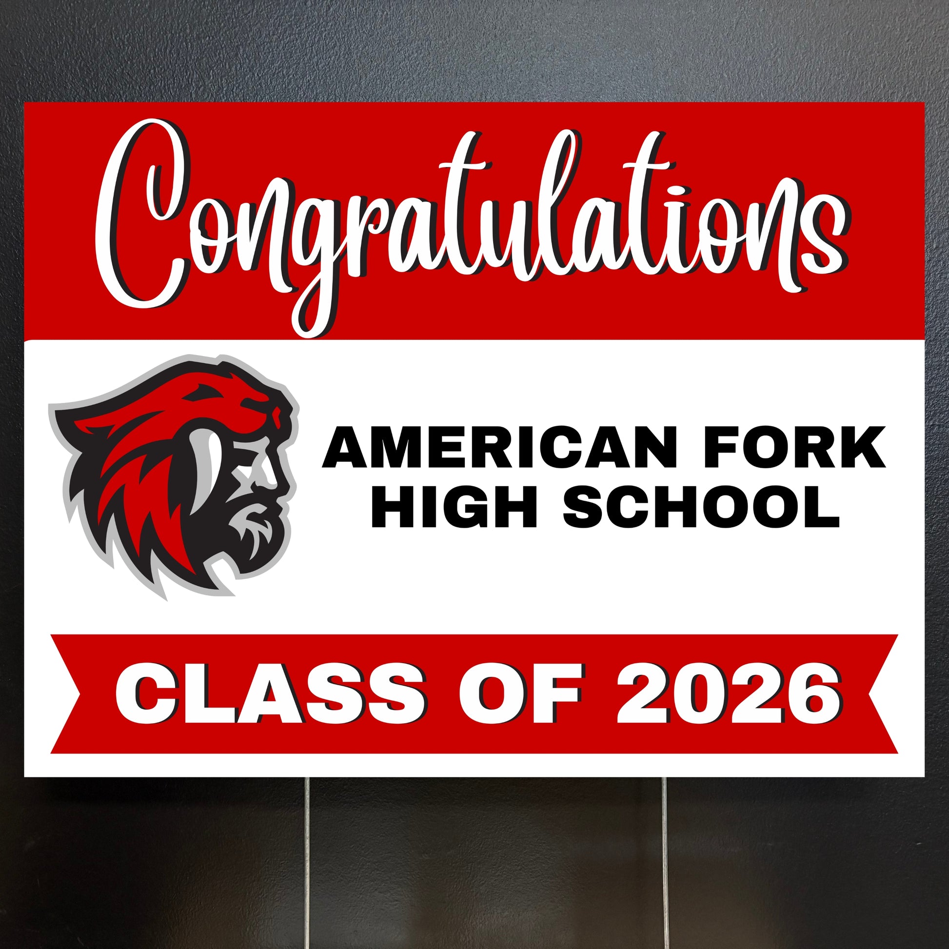 Graduation yard sign for American Fork High School Class of 2026 with school logo.