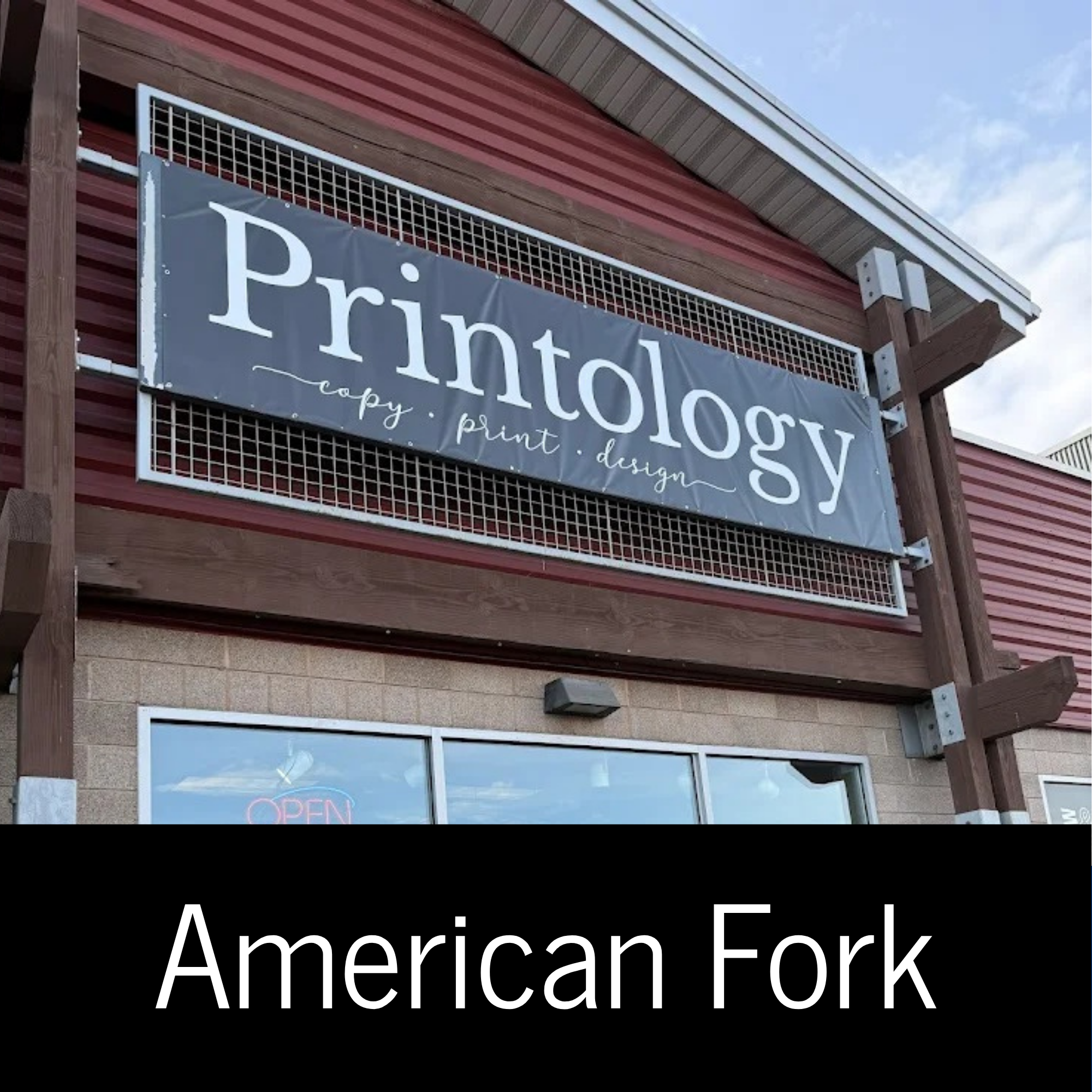 Printology building sign with 'American Fork' text