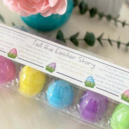 A pack of colorful plastic eggs with labels for an Easter story kit.