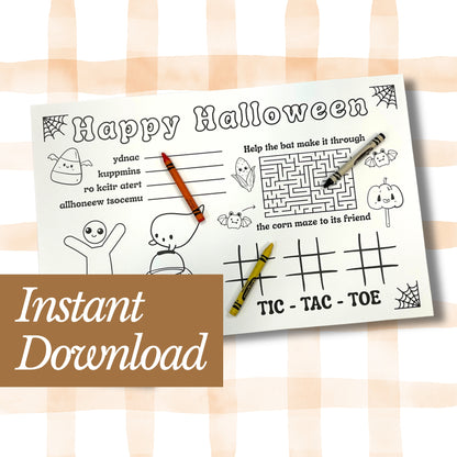 Halloween-themed activity placemat with crayons on a checkered background