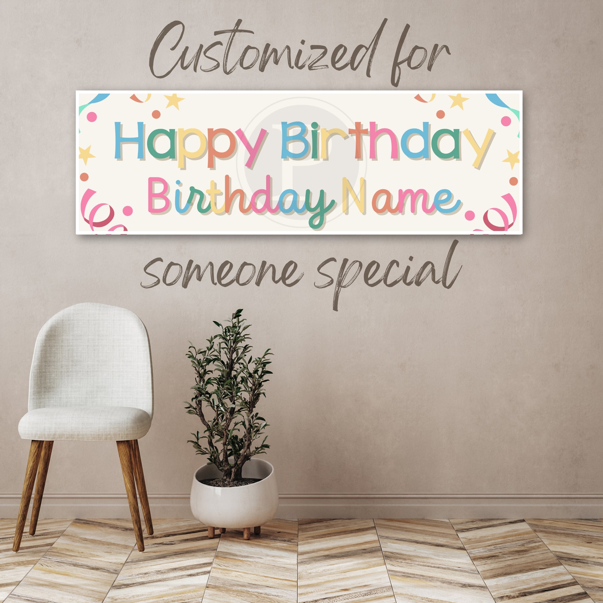 Decorative birthday banner with customizable text on a wall with a chair and plant.