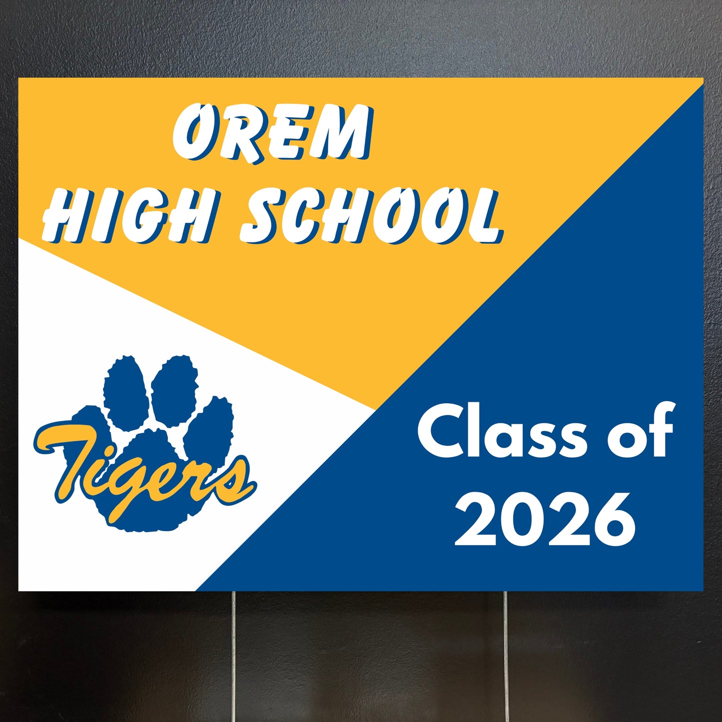Orem High School Class of 2026 yard sign with tiger logo on a yellow, white, and blue background.