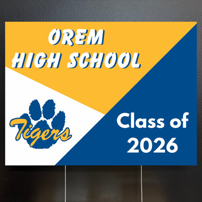 Orem High School Class of 2026 yard sign with tiger logo on a yellow, white, and blue background.